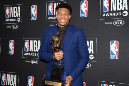 Milwaukee Bucks forward Giannis Antetokounmpo with his 2019 MVP Award at the NBA Awards Show