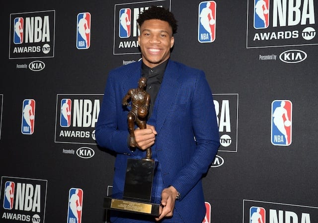 Milwaukee Bucks forward Giannis Antetokounmpo with his 2019 MVP Award at the NBA Awards Show