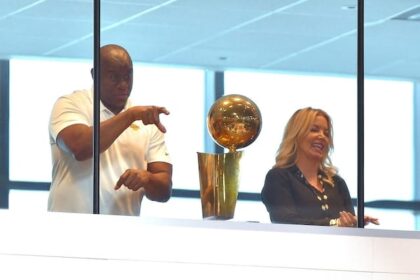 Jeanie Buss, Magic Johnson, Lakers championship trophy